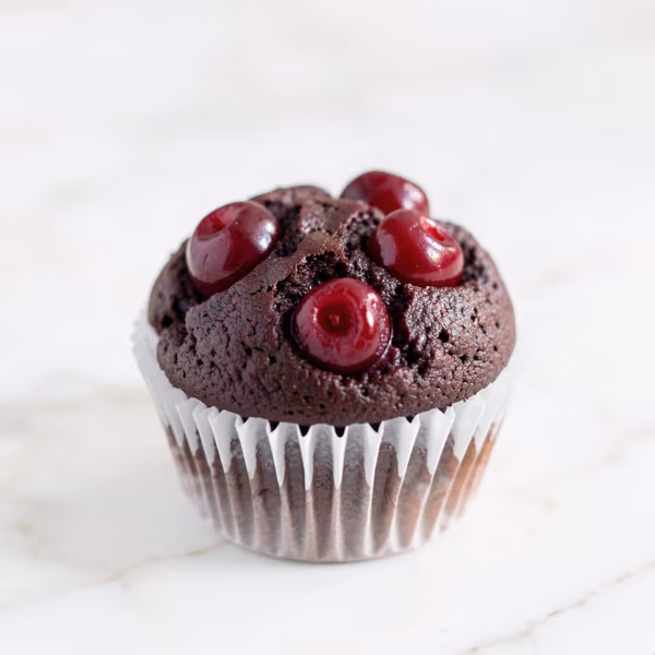 AI-genereret illustration: chokolade muffins med kirsebær